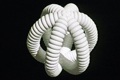 white abstract graphic on black background