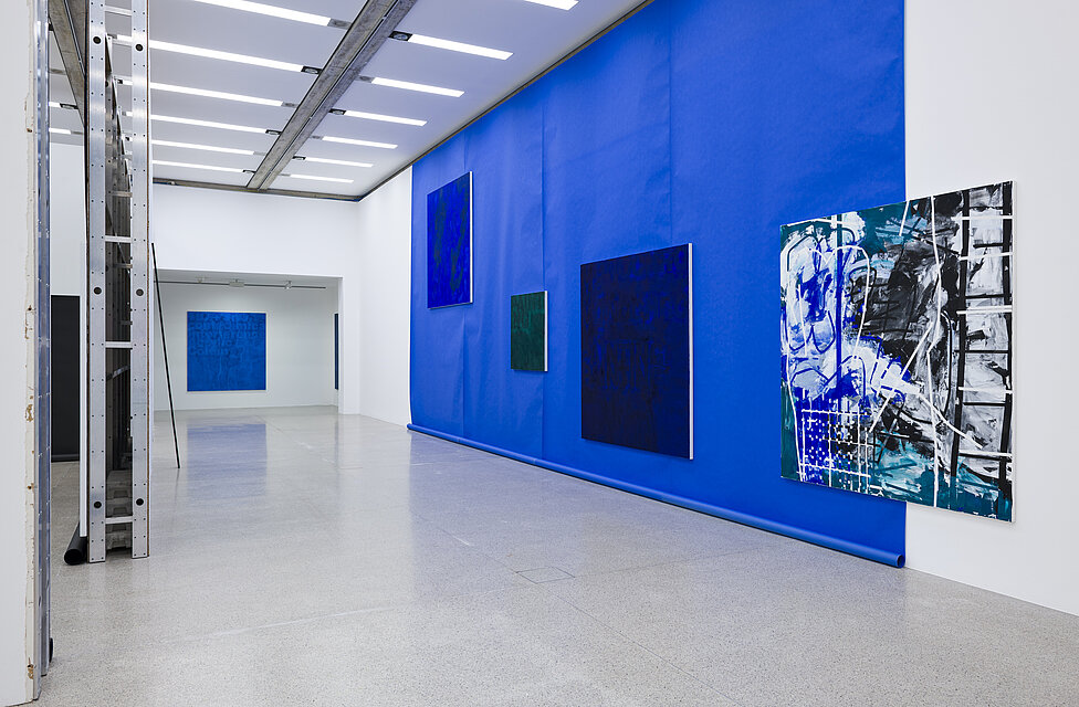 Four large-format paintings on a dark blue background. 